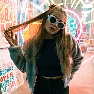 Pro Music Help - lady standing by record shop
